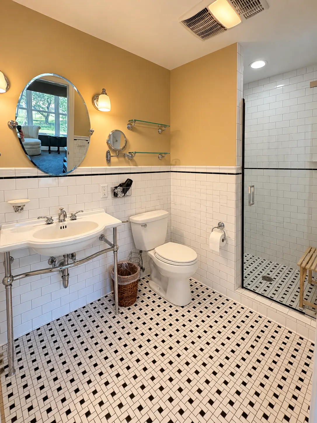 A white subway-tile bathroom with a walk-in shower